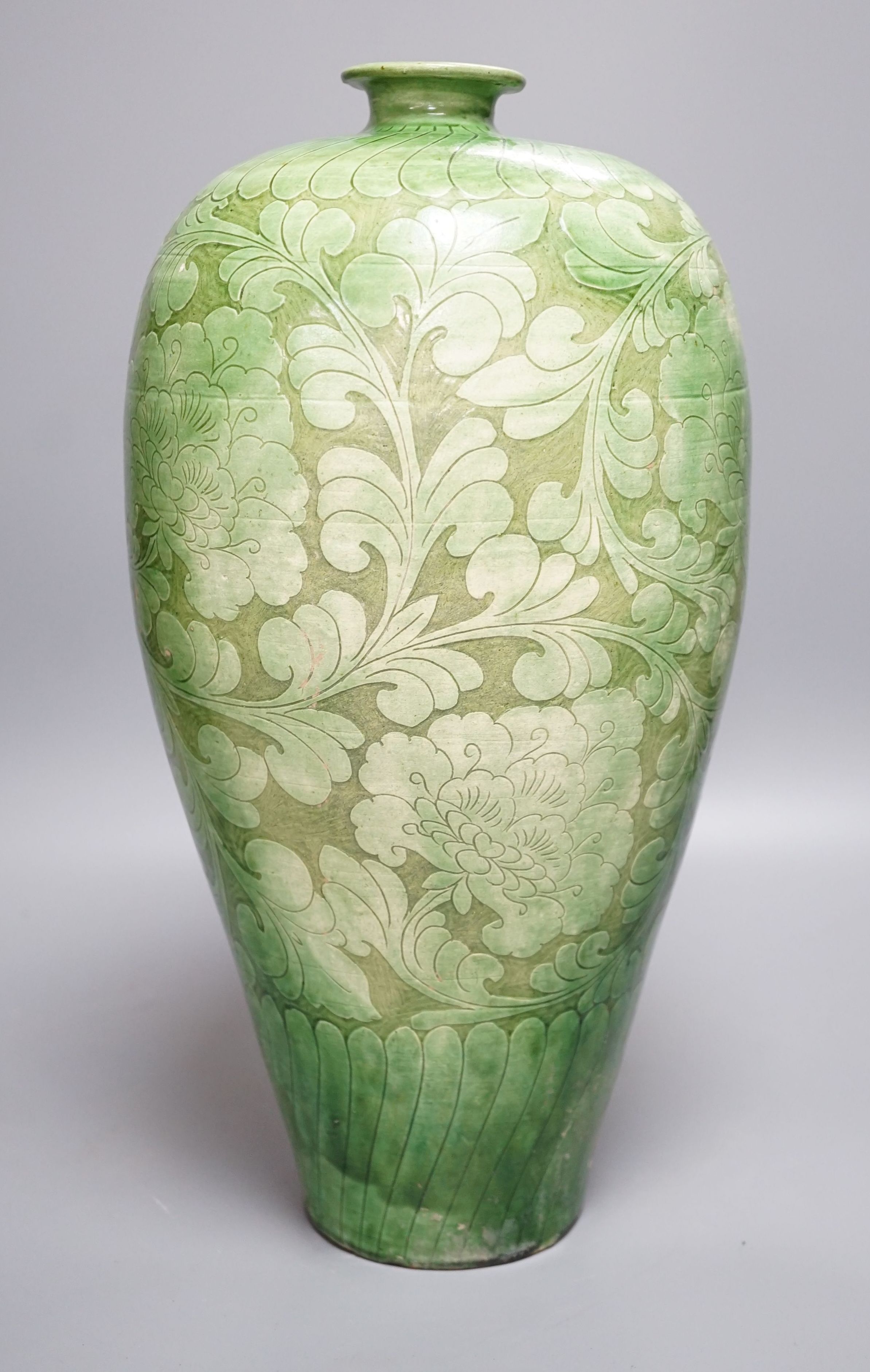 Chinese cizho green vase with carved decoration, 39cm high